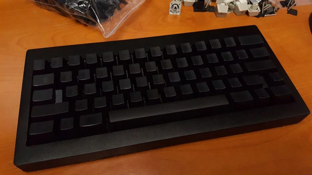What makes up a Model F Keyboard? + Detailed production status of each part 17 The compact cases are made of high quality but lightweight anodized aluminum – great for frequent travelers. The compact cases cut the weight down to about 3 or 4 pounds from 8 to 10 pounds of the original style cases.