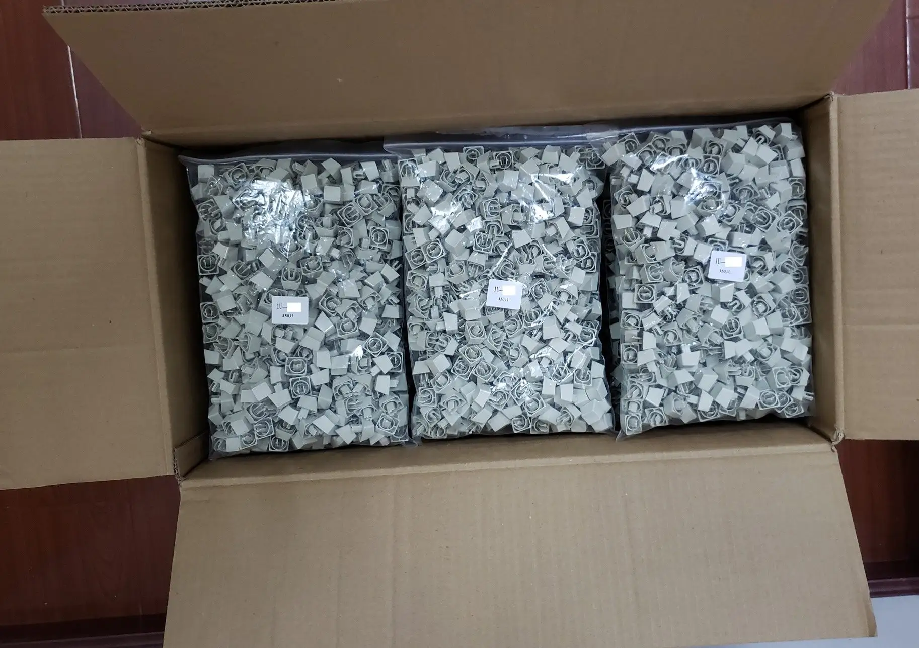 We reached $600,000 today! + Production Status Update 1 The 200,000 key production is moving along nicely and should be finished in the coming weeks. Below is a photo of one box of completed 1U keys. After that is the dye sub.