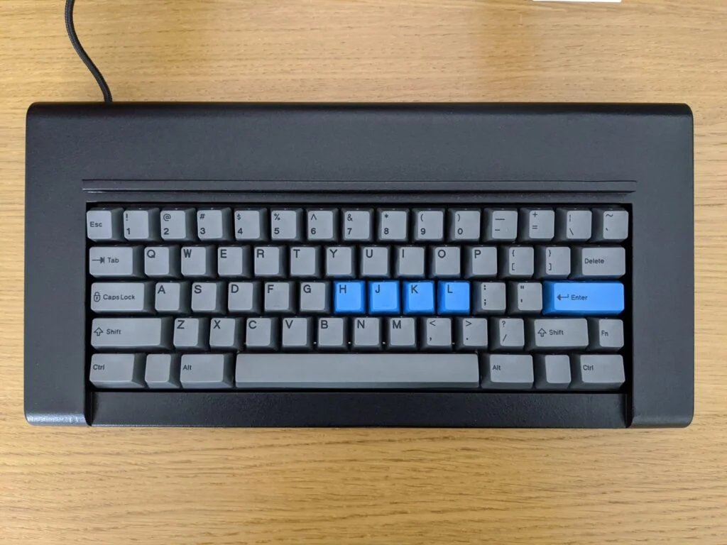 Brand New Model F August Update – keyboards continue shipping, new Beam Spring project launch, and more! 12 With permission I am sharing another customer image: Black classic style F62 case, HHKB style split right shift and split backspace, with dark gray printed keys and several blue printed keys. I am really liking the two tone color scheme where before I was more into the one color option for the blue sets and gray sets. I can now see a bit more clearly why so many people have ordered just the blue Enter and Esc keys for their boards or ordered one set in each color.