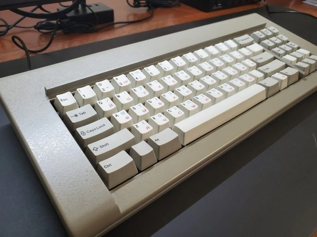The factory can even do green, red, and blue for the sublimation text/graphics and multiple colors can be printed at the same time and on the same keycap, as shown in the three Russian-Hebrew-English photos below. If anyone wants one-off sets in various colors it is possible, though some sublimation colors come out better than others and you’d have to make them to find out. So far green, blue, and red have come out nicely.