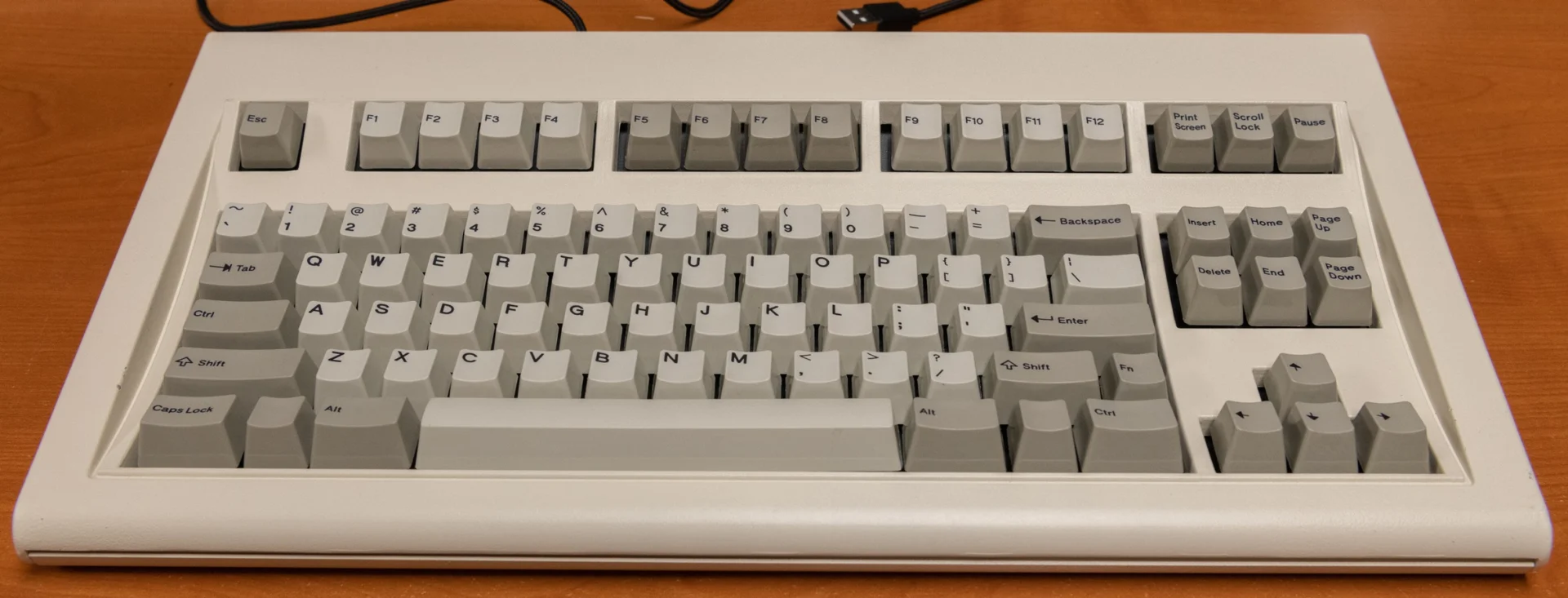 You can also notice the changes to the interconnections between top and bottom inner assembly:1. They now have additional tabs between the first two rows, just like the IBM F122 and F104 originals. I believe this was done to keep the plates as tight as possible, to allow for the snappiest of clicks upon actuation of each key. The Round 1 compact style F104 and FSSKs do not have these extra tabs. I can tell that the Round 2 boards have some extra clickiness/snappiness to them compared to the Round 1 boards, though both have sufficient clickiness/snappiness.2. The controller tabs have been modified slightly on the M Style boards to make them simpler and a bit less flexible. Sometimes when unscrewing the controller and adjusting an old bottom inner assembly, the old tabs would move out of position which would require some pliers to move them back into position. They are also slightly taller, to allow for more room between the controller and BIA.