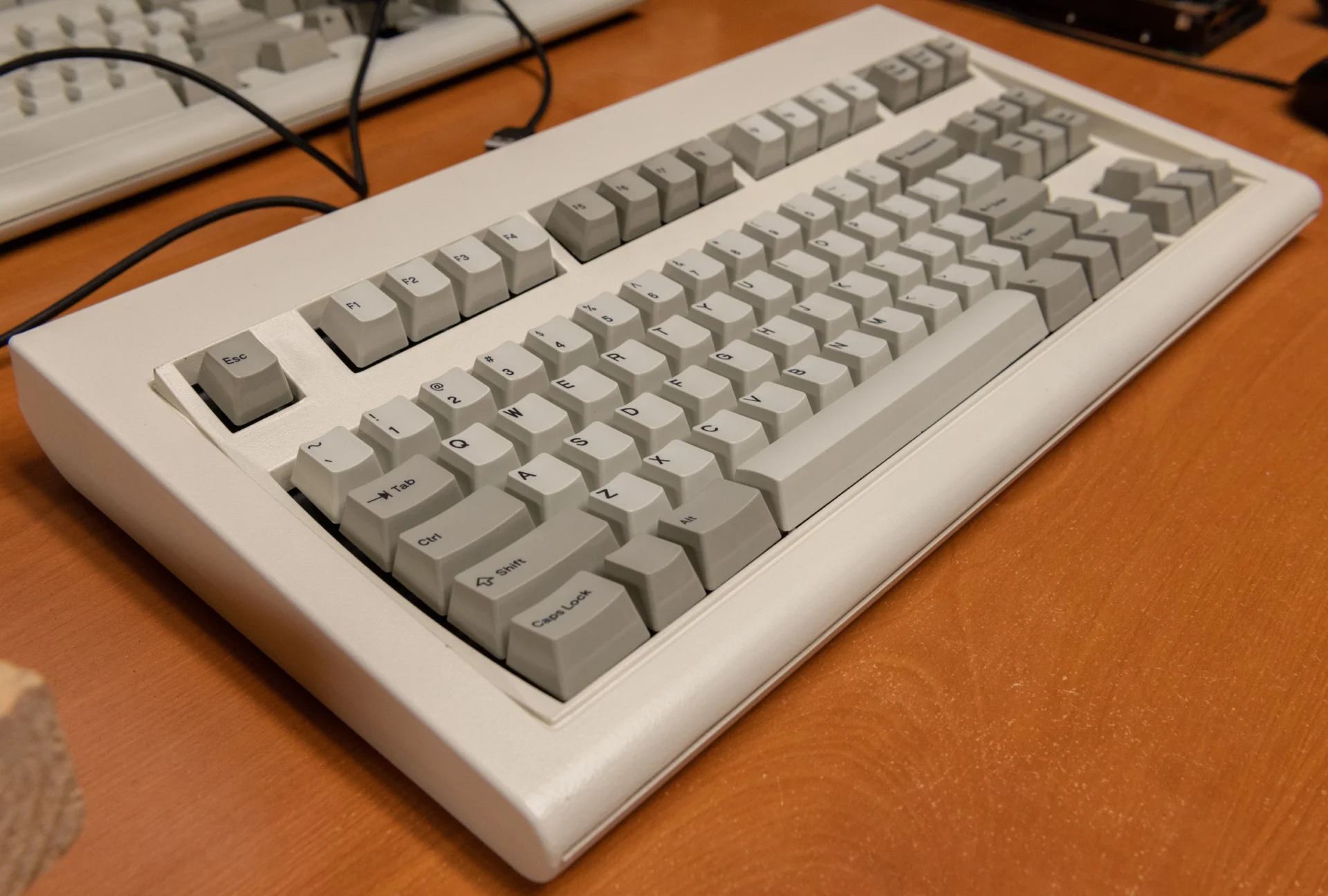 You can also notice the changes to the interconnections between top and bottom inner assembly:1. They now have additional tabs between the first two rows, just like the IBM F122 and F104 originals. I believe this was done to keep the plates as tight as possible, to allow for the snappiest of clicks upon actuation of each key. The Round 1 compact style F104 and FSSKs do not have these extra tabs. I can tell that the Round 2 boards have some extra clickiness/snappiness to them compared to the Round 1 boards, though both have sufficient clickiness/snappiness.2. The controller tabs have been modified slightly on the M Style boards to make them simpler and a bit less flexible. Sometimes when unscrewing the controller and adjusting an old bottom inner assembly, the old tabs would move out of position which would require some pliers to move them back into position. They are also slightly taller, to allow for more room between the controller and BIA.