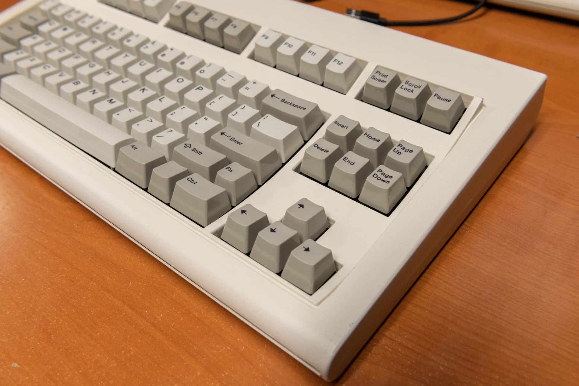 You can also notice the changes to the interconnections between top and bottom inner assembly:1. They now have additional tabs between the first two rows, just like the IBM F122 and F104 originals. I believe this was done to keep the plates as tight as possible, to allow for the snappiest of clicks upon actuation of each key. The Round 1 compact style F104 and FSSKs do not have these extra tabs. I can tell that the Round 2 boards have some extra clickiness/snappiness to them compared to the Round 1 boards, though both have sufficient clickiness/snappiness.2. The controller tabs have been modified slightly on the M Style boards to make them simpler and a bit less flexible. Sometimes when unscrewing the controller and adjusting an old bottom inner assembly, the old tabs would move out of position which would require some pliers to move them back into position. They are also slightly taller, to allow for more room between the controller and BIA.