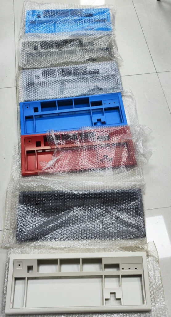 Brand New Model F October 2023 Update: major discounts to end the old projects, production updates, Model M vs. F differences, Vial firmware, new RP2040 controller 21 All cases are powdercoated going forward, so they should look like the painted versions of the cases. The cases will have textured powdercoating, not like the smooth more modern powdercoating of the 2nd batch of ultra compact F62 and F77 cases (what has been shipping out in the past couple years), and not like the anodizing of the other compact cases (F104/FSSK/F15/F50/F Ergo). Here is a nice “group photo” of the F122 case samples being unboxed, from earlier this year, one in each of the available colors: