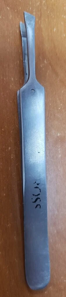 My own tweezers used for reinstalling springs – has anyone come across something like the below tweezers, with a straight end part and an angled edge as shown below?