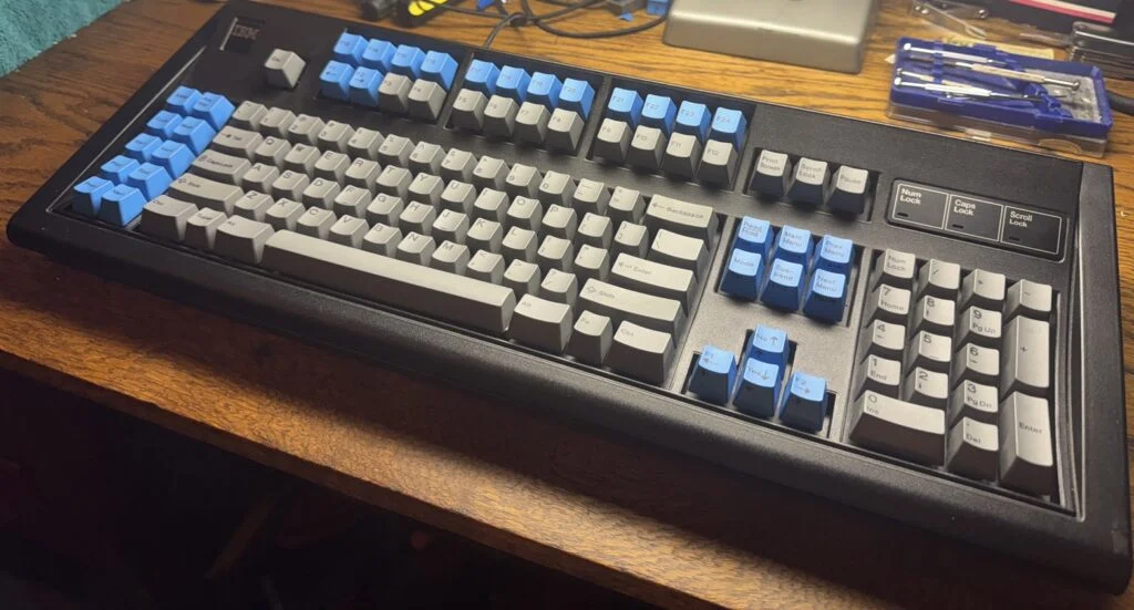 First, here is a customized New F122 with third party extras: an IBM badge and LED overlay.